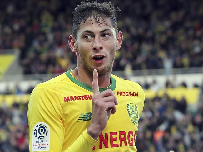 In this his picture taken on Nov. 4, 2018, Argentine soccer player, Emiliano Sala, of the FC Nantes club, western France, reacts after scoring during a soccer match against Guingam, in Nantes, France. The French civil aviation authority says Emiliano Sala was aboard a small passenger plane that went missing off the coast of the island of Guernsey. (AP Photo/David Vincent)