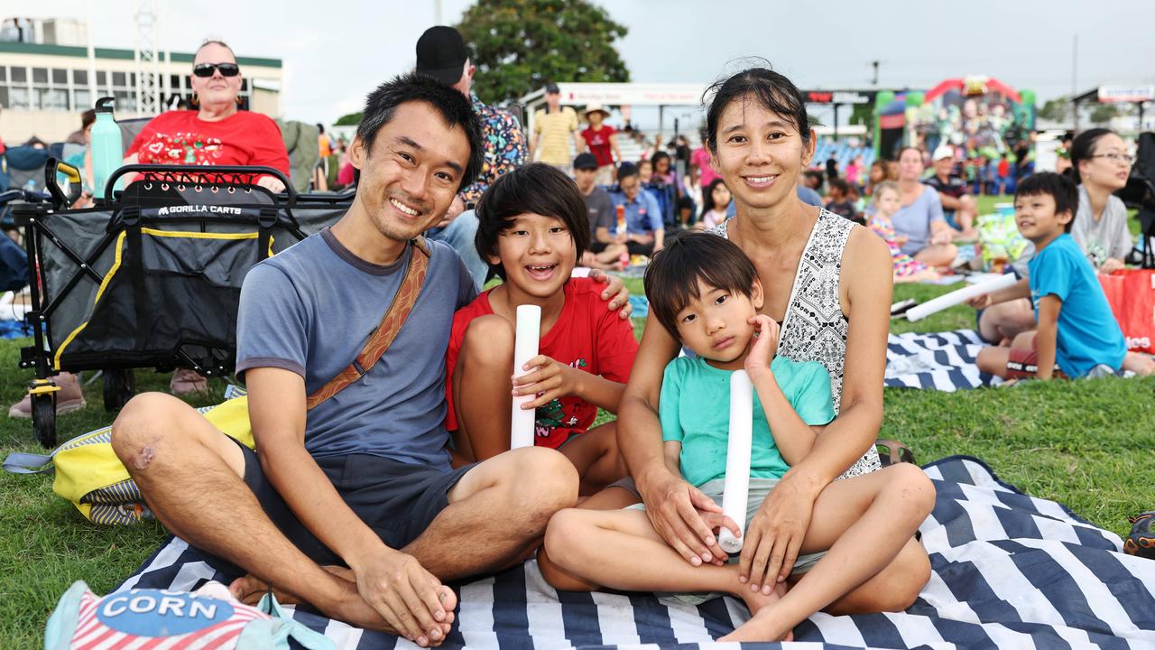 Naoki Mitamura, Tomoki Mitamura, 11, Yuki Mitamura and Kenji Mitamura, 6, at the Cairns Churches Joy to the World Community Carols, held at the Cairns Showgrounds. Picture: Brendan Radke