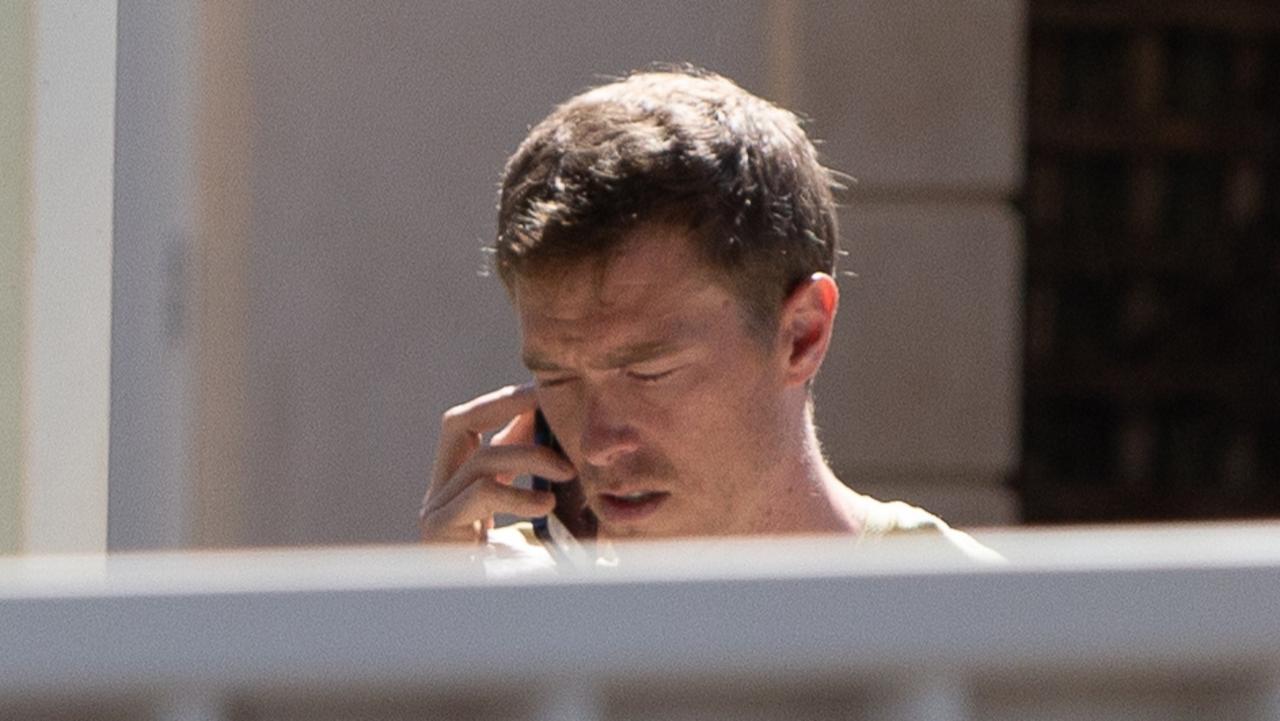 Australian cyclist Rohan Dennis speaks on the phone in the backyard of his Medindie home in Adelaide after being released on bail. Picture: NCA NewsWire/ Brett Hartwig
