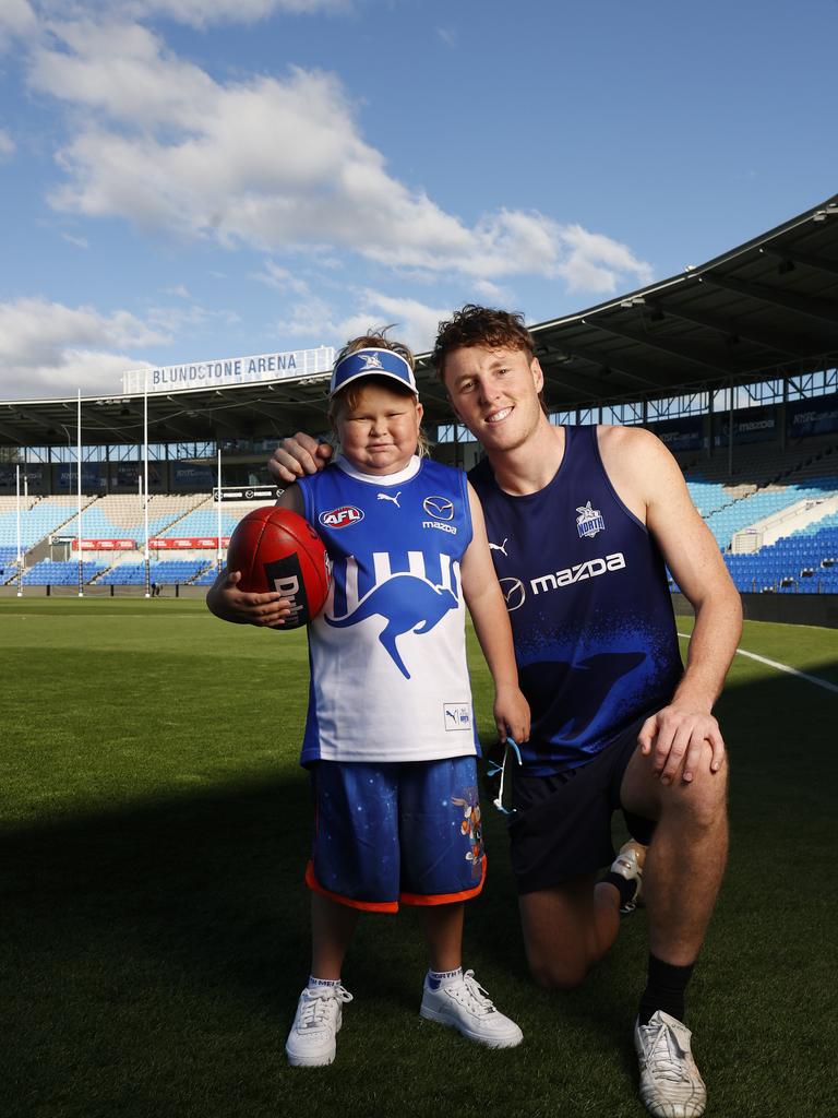 George McNees 9 of Hobart with Nick Larkey North Melbourne Football Club player who he has struck up a friendship with. George has been having on going treatment after being diagnosed with a brain tumour at age 11 months. Picture: Nikki Davis-Jones