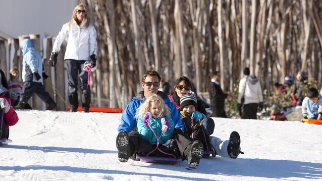 Enjoying the toboggan slopes at Lake Mountain.