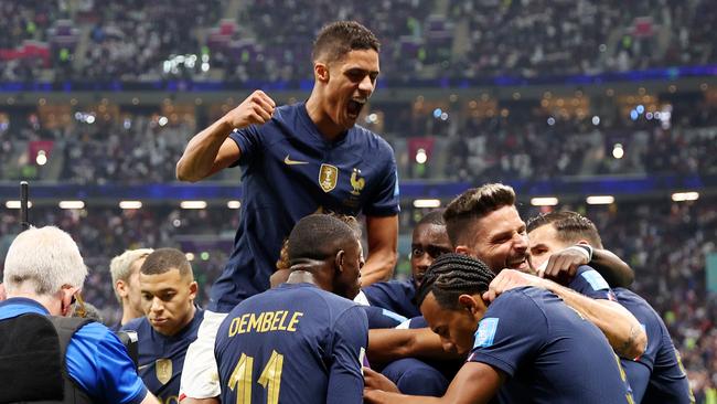 France celebrate the opener. (Photo by Julian Finney/Getty Images)