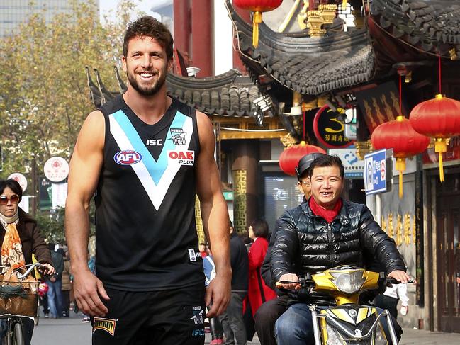 NO INTERNET-  AFL - Port Adelaide in Shanghai. Captain Travis Boak walks around the Old Town. Picture Sarah Reed