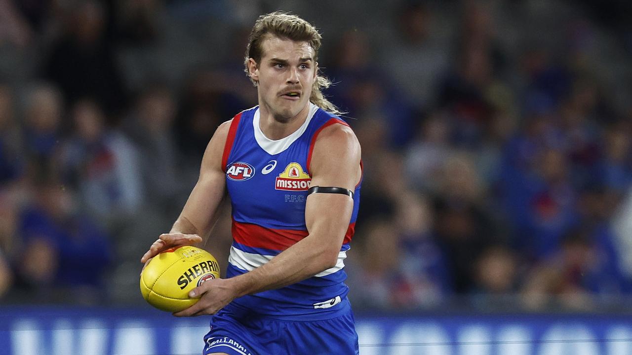 MELBOURNE, AUSTRALIA - AUGUST 20: Bailey Smith of the Bulldogs runs with the ball during the round 23 AFL match between Western Bulldogs and West Coast Eagles at Marvel Stadium, on August 20, 2023, in Melbourne, Australia. (Photo by Daniel Pockett/Getty Images)