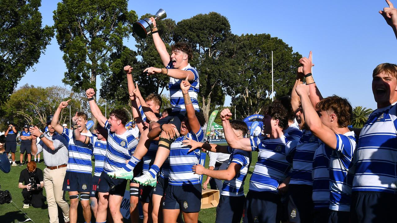 Nudgee College captain John Grenfell (trophy in hand) celebrates a 45th premiership for his school last weekend. GPS first XV rugby grand final, Nudgee College Vs BSHS. Saturday September 7, 2024. Picture, John Gass