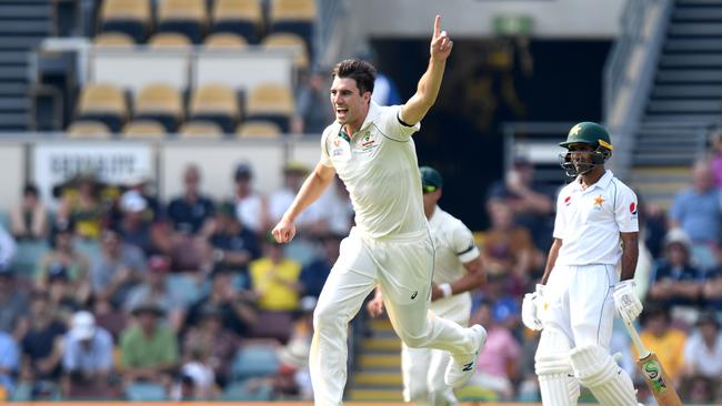 Cummins celebrates the wicket before it was checked by the third umpire. Picture: Getty