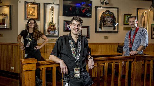 Hard Rock Cafe staff Pamela Berthelot, Nick Graham and Maurice Van Tilburg have been working hard to revamp the restaurant. Picture: Jerad Williams