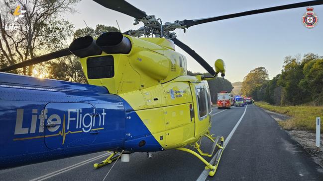 The Old Bruce Highway was blocked to allow the rescue helicopter to land.