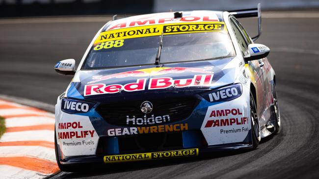 Jamie Whincup in a familiar pose at Mt Panorama behind the wheel of his Team Holden Commodore ZB. Picture: Daniel Kalisz/Getty Images.