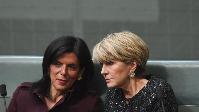 Former Australian Foreign Minister Julie Bishop (right) and Liberal MP Julia Banks react during House of Representatives Question Time at Parliament House in Canberra, Thursday, September 13, 2018. (AAP Image/Lukas Coch) NO ARCHIVING