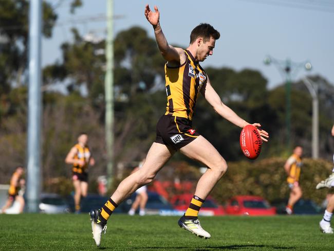 Dallas Willsmore gets the ball on his boot. Picture: James Ross/AAP