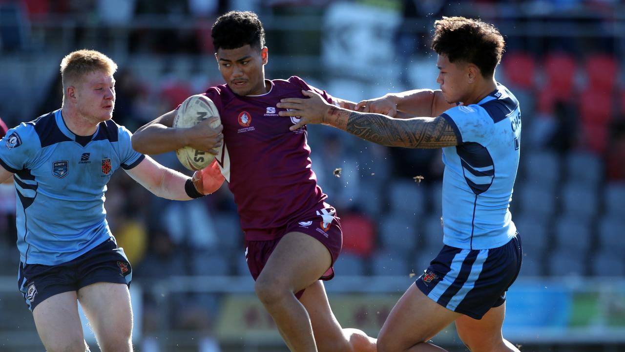 QLD's Karl Oloapu makes a break during the under 18 ASSRL schoolboy rugby league championship grand final between. Picture: Zak Simmonds