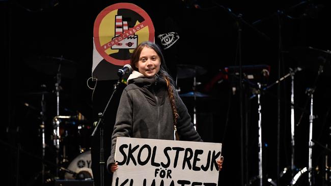 Thunberg delivers a speech after a mass climate march to demand urgent action in Madrid