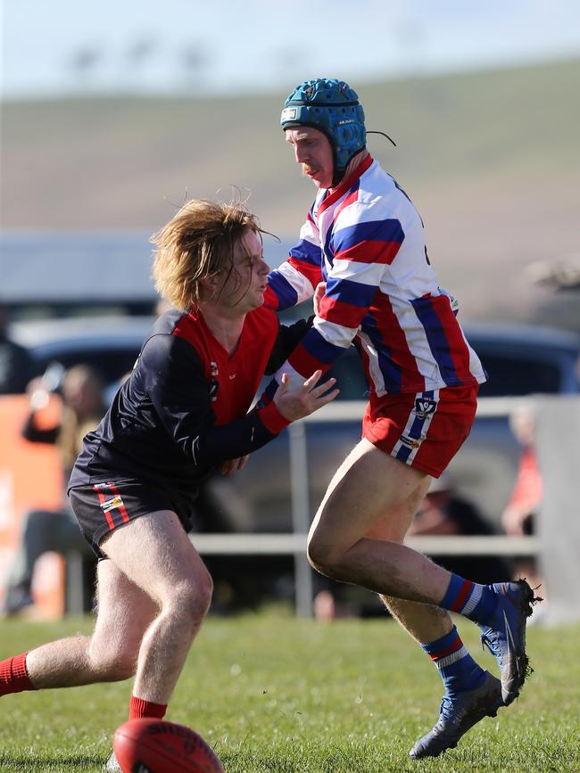 Lindenow South coach Nathan Pollard, right, in the Omeo and District league grand final this year. Picture Yuri Kouzmin