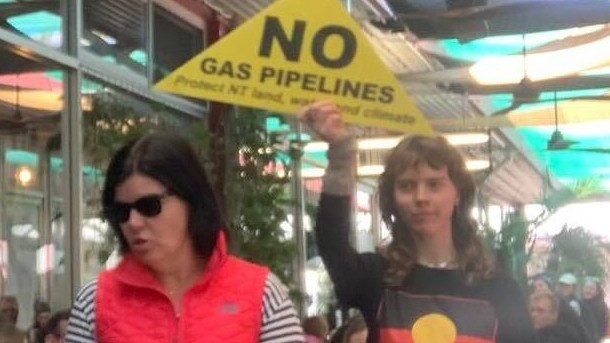 Central Australian Frack Free Alliance protesters voiced their concerns next to Chief Minister Natasha Fyles in Alice Springs over the weekend. Picture: CAFFA