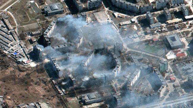 This Maxar satellite image taken on March 19 shows burning apartment buildings in northeastern Mariupol. Picture: AFP/Maxar Technologies