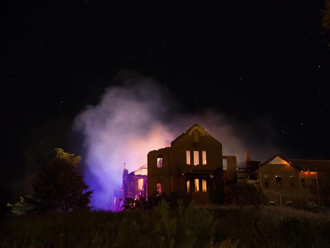 Former St John's orphanage in Goulburn well alight after a fire in 2016. Photo Sara Fife.