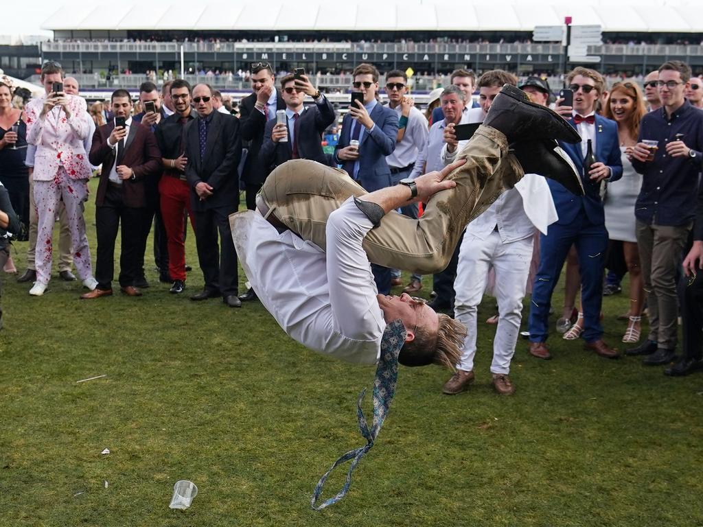 ”What did you do at the Melbourne Cup?” Answer: Backflips. Picture: Scott Barbour/AAP
