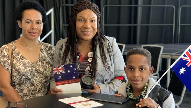 (From left to right) Alexia Merimba, Nita Asuman and Ethan Lyiambian at the Australia Day citizenship ceremony at the MECC on January 26, 2023. Picture: Duncan Evans