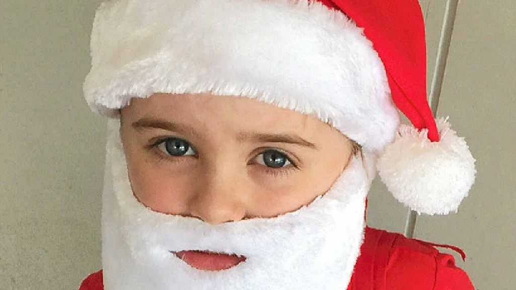 In a suit made by his grandmother, three-year-old Bailey Fitzgerald is delighting shoppers. Picture: Bev Lacey