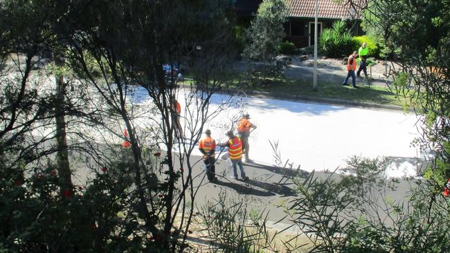 Workers completing resurfacing works on Deep Creek Drive in Doncaster East earlier this month. Picture: Supplied.