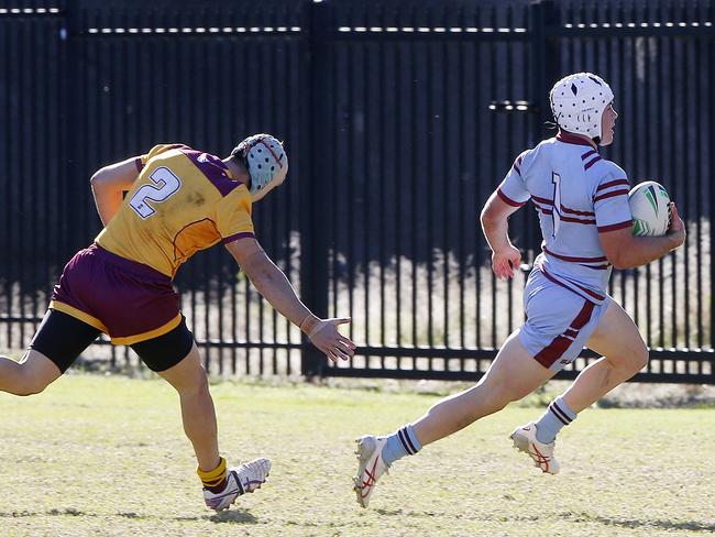 Holy Cross's Sam Mardini Chases St Greg's Fullback Heath mason to the line. Picture: John Appleyard