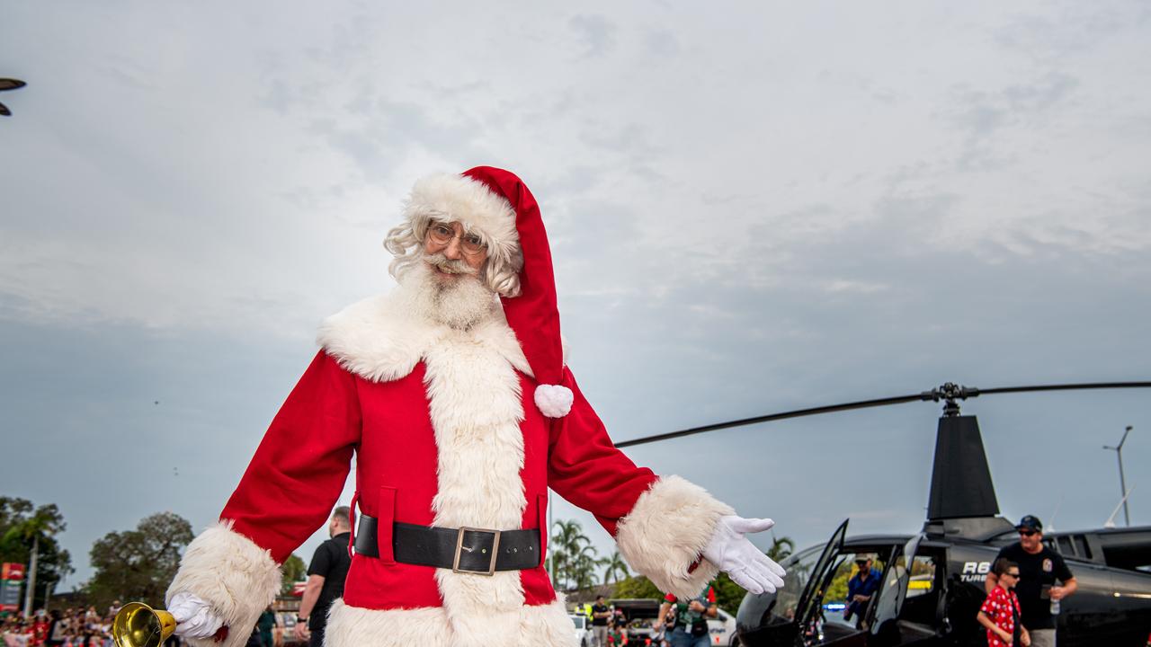 Safe and sound! Santa popped in by chopper to meet kids and their parents at Casuarina Square. Picture: Pema Tamang Pakhrin