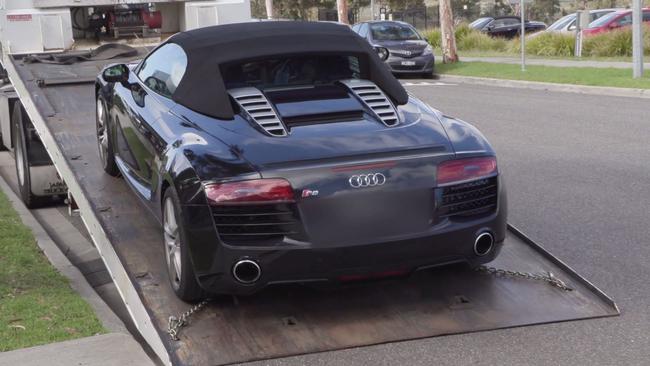 An Audi R8 seized in the raids.