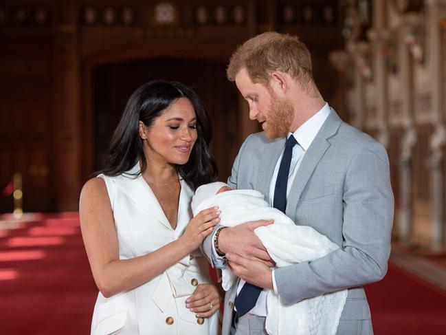 The royal couple gaze at their newborn. Picture: Getty Images