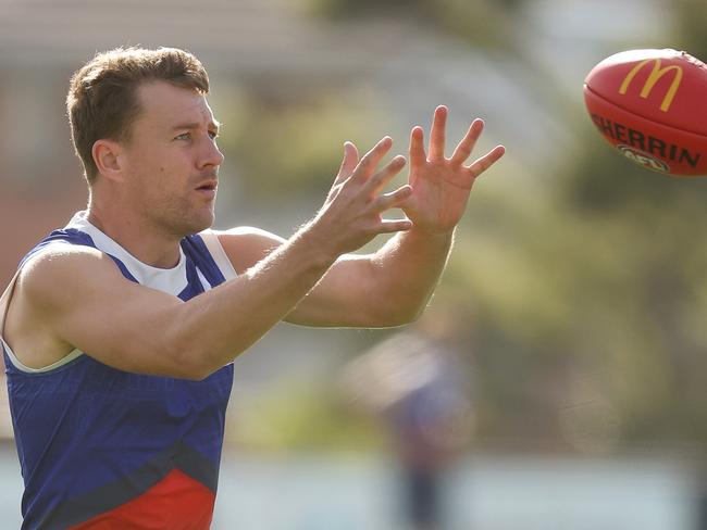 MELBOURNE, AUSTRALIA - MARCH 20: Jack Macrae of the Bulldogs in action during a Western Bulldogs AFL training session at Whitten Oval on March 20, 2024 in Melbourne, Australia. (Photo by Daniel Pockett/Getty Images)