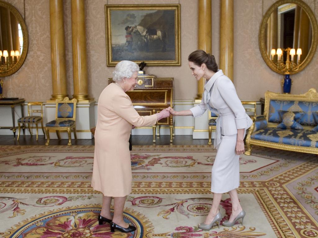 Angelina Jolie meets with the Queen in 2014. Picture: AFP