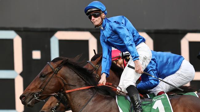 SYDNEY, AUSTRALIA - SEPTEMBER 28: James McDonald riding Broadsiding wins Race 8 James Squire Golden Rose during "Golden Rose Day" Sydney Racing at Rosehill Gardens on September 28, 2024 in Sydney, Australia. (Photo by Jeremy Ng/Getty Images)