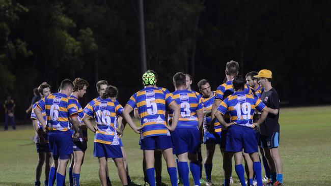 The Waves Falcons in a huddle during a Spring Cup game