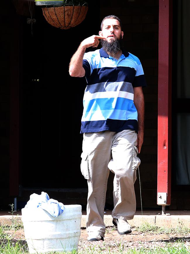 Haddad outside his home in southwest Sydney.