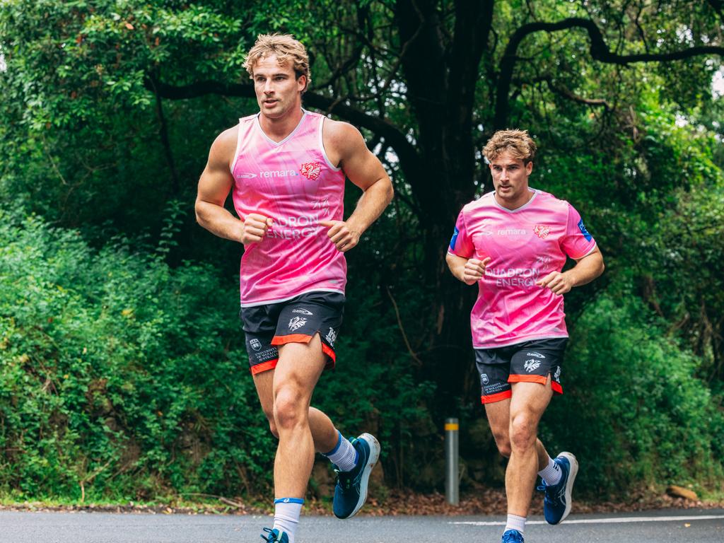 Ryan and Toby Couchman on the road run. Photo: Dragons