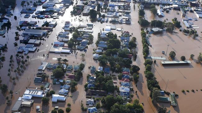 An aerial photograph showing floodwaters engulfing central Lismore. Photo: Dave Hunt.