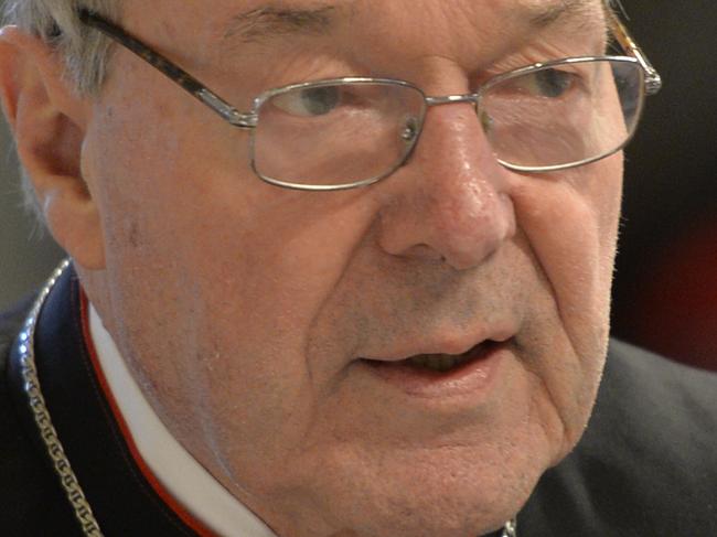 Australian Cardinal George Pell, Prefect of the Secretariat for the Economy of the Holy See arrives to attend a Chrism mass for Holy Thursday (Maundy Thursday) which marks the start of Easter celebrations on April 2, 2015 at St Peter's basilica in Vatican. AFP PHOTO / ANDREAS SOLARO