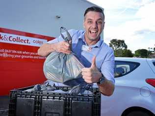 Store support manager Luke Callaghan gives Coles Gympie's new 'Click and Collect' service a big thumbs up. Picture: Renee Albrecht