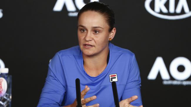 Australia's Ashleigh Barty gestures during a press conference ahead of the Australian Open tennis championship in Melbourne, Australia, Sunday, Jan. 19, 2020. (AP Photo/Dita Alangkara)