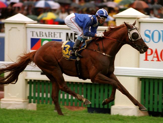 Jeune wins the 1994 Melbourne Cup with jockey Wayne Harris at the reins.