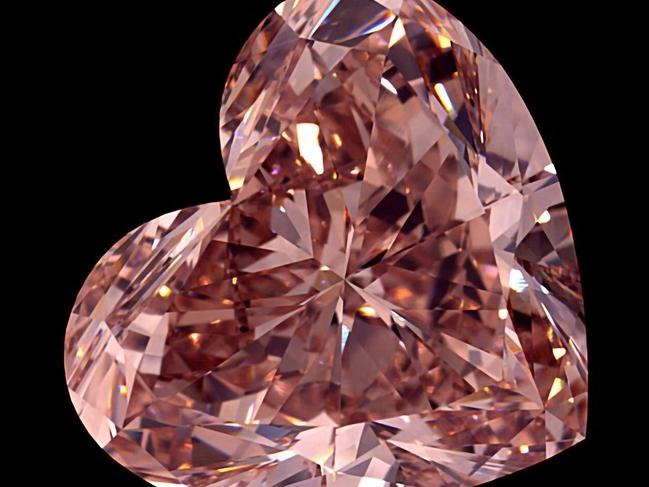 A Perth-based miner has unveiled three stunning and extremely rare coloured diamonds cut from a whopping 46 carat gem extracted at its flagship asset in Angola. Lucapa Diamond Company produced a 15.2 carat heart-shaped and two pear-shaped diamonds weighing 3.3 carats and 2.3 carats from the rough gem. Picture: Lucapa Diamond Company via NCA NewsWire