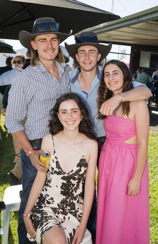 At the Warwick Cup race day are (seated) Kate McCarthy, Dan Morris, Lachlan Collins (back, centre) and Olivia Lack at Allman Park Racecourse, Saturday, October 14, 2023. Picture: Kevin Farmer