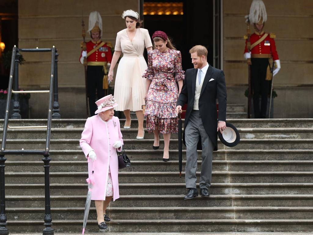 The Queen with Prince Harry, Princess Eugenie and Princess Beatrice. Picture: AFP