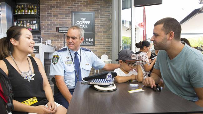 The Tannoury family of Spring Farm chat with Superintendent Wayne Benson at the Campbelltown Coffee with a cop event. Picture: Melvyn Knipe