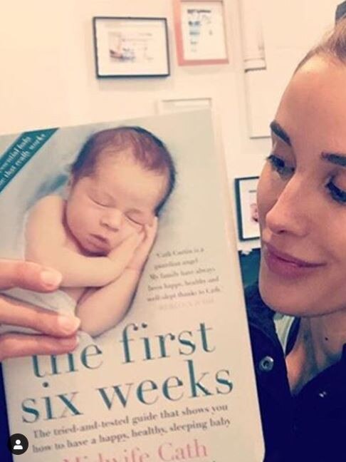 Rebecca Judd with Cath Curtin's book.