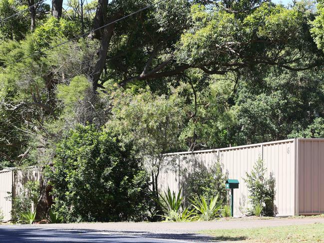 Millionaire Tony Denny's Colorbond fence has ruffled feathers in the Killcare Heights community. Picture: Sue Graham