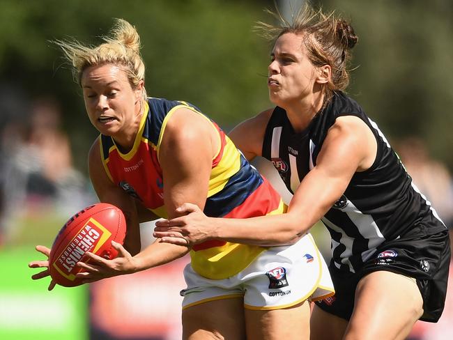 MELBOURNE, AUSTRALIA - MARCH 18:  Courtney Cramey of the Crows marks during the round seven AFLW match between the Collingwood Magpies and the Adelaide Crows at Olympic Park on March 18, 2018 in Melbourne, Australia.  (Photo by Quinn Rooney/Getty Images)