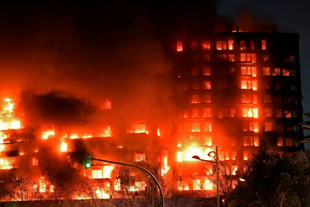Four dead, 14 missing after fire guts Spanish apartment block