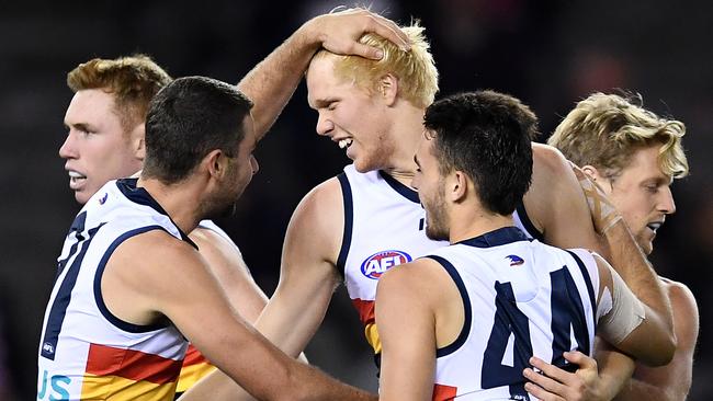 Crows teammates congratulate Elliott Himmelberg after kicking a goal against St Kilda. Picture: Getty Images