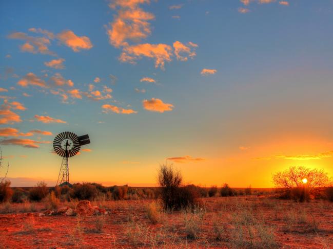 Lonely windmill in the evening time somewhere in remote Australia.